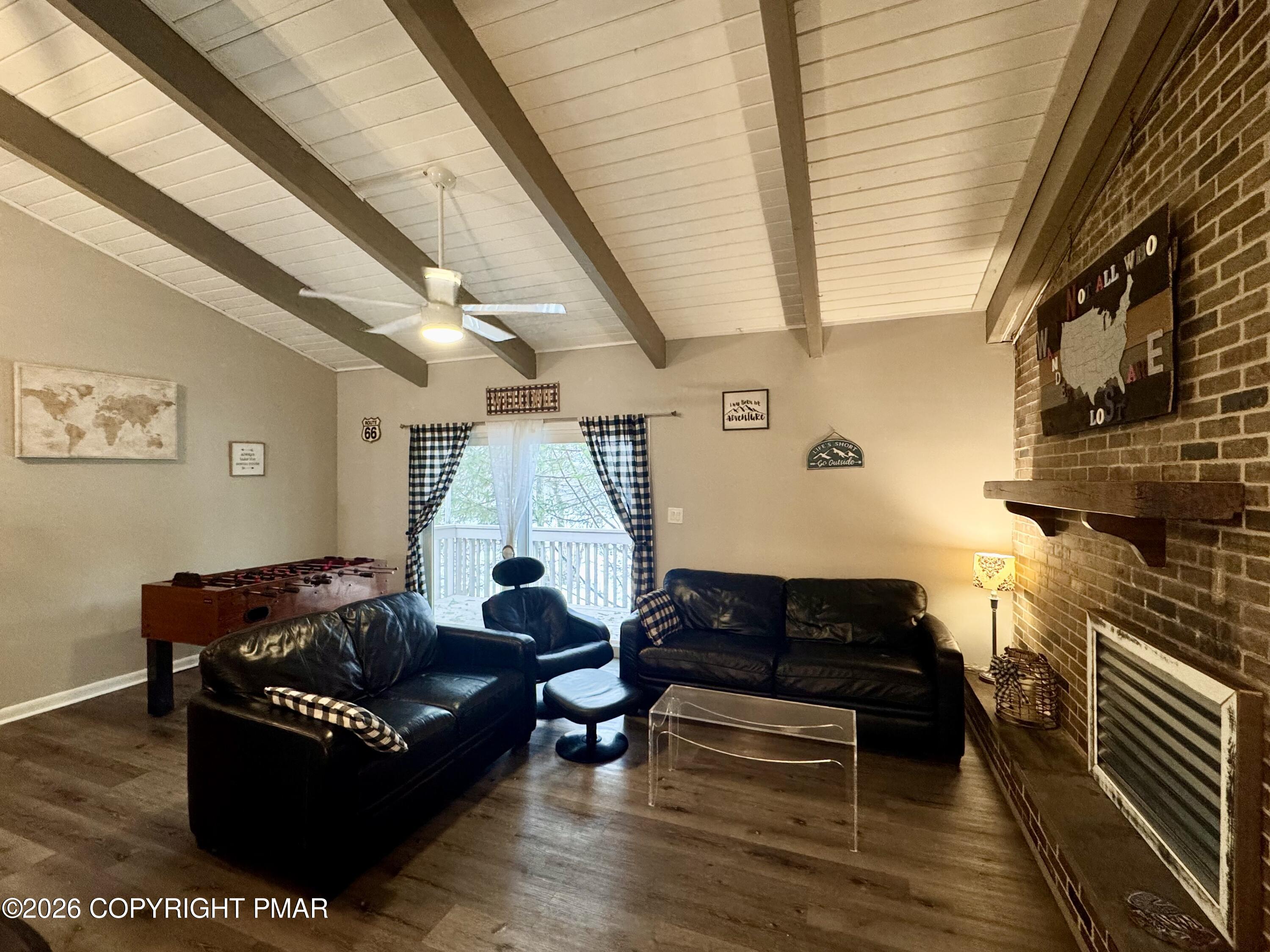 9 Sassafras Road Lake Harmony, PA 18624 - Photo 6 of 35 a living room with furniture and a wooden floor