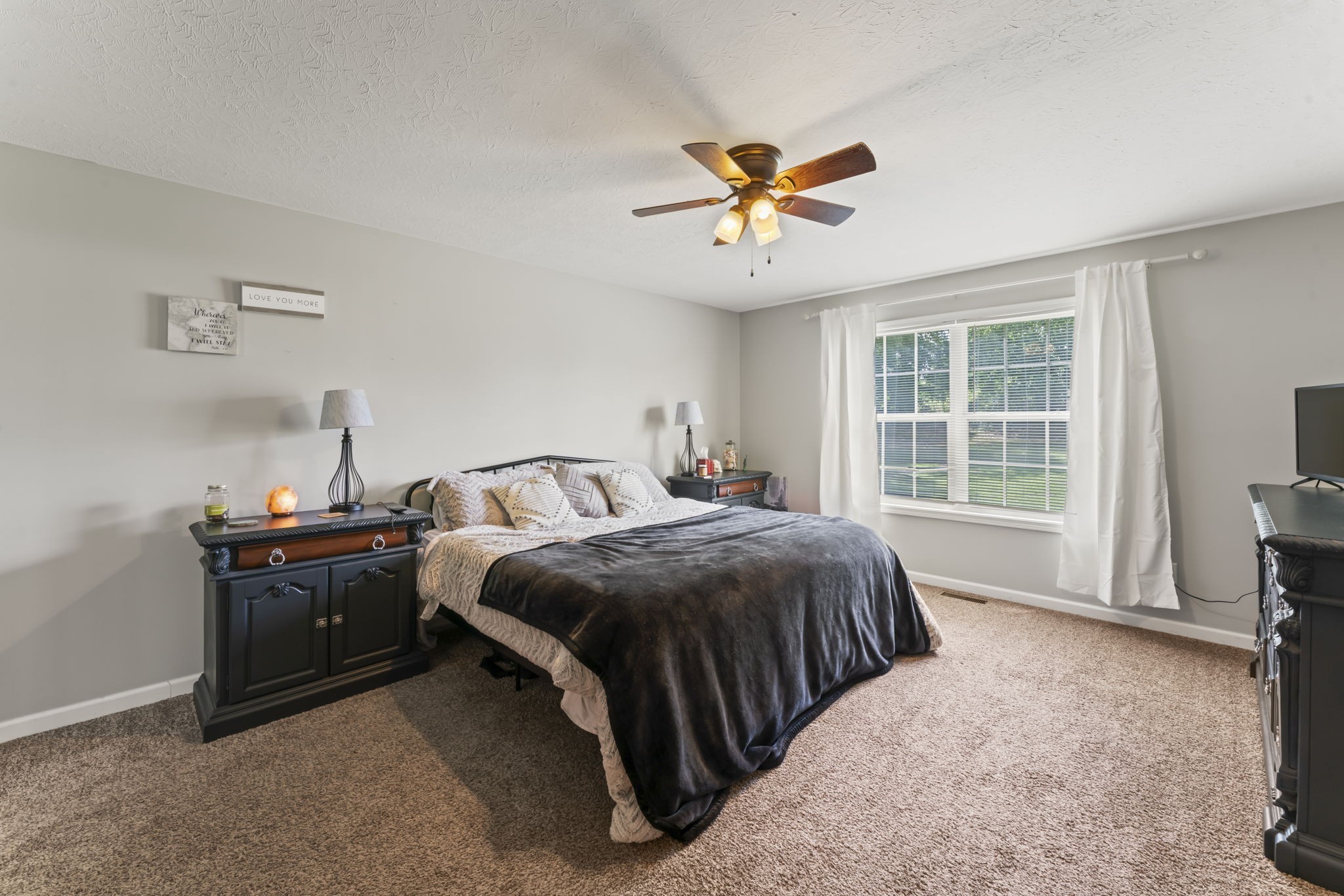 1070 Mt Vernon Road Bethpage, TN 37022 - Photo 13 of 20 a bedroom with a bed and window