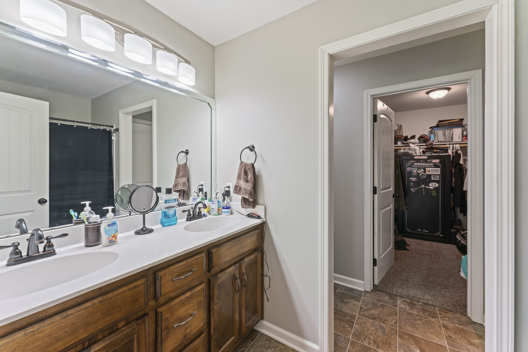 1070 Mt Vernon Road Bethpage, TN 37022 - Photo 14 of 20 a en suite bathroom with a double vanity sink and a mirror