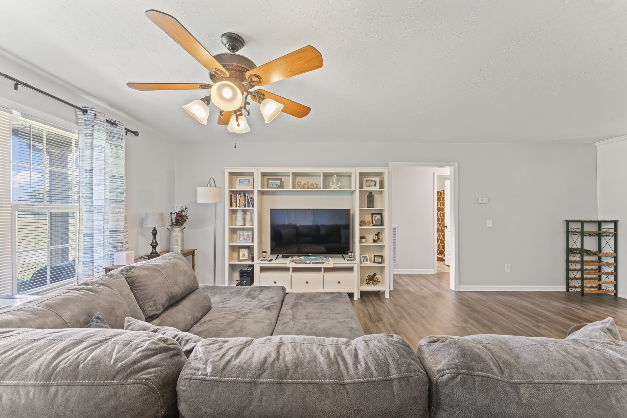 1070 Mt Vernon Road Bethpage, TN 37022 - Photo 6 of 20 a living room with furniture a flat screen tv and a large window