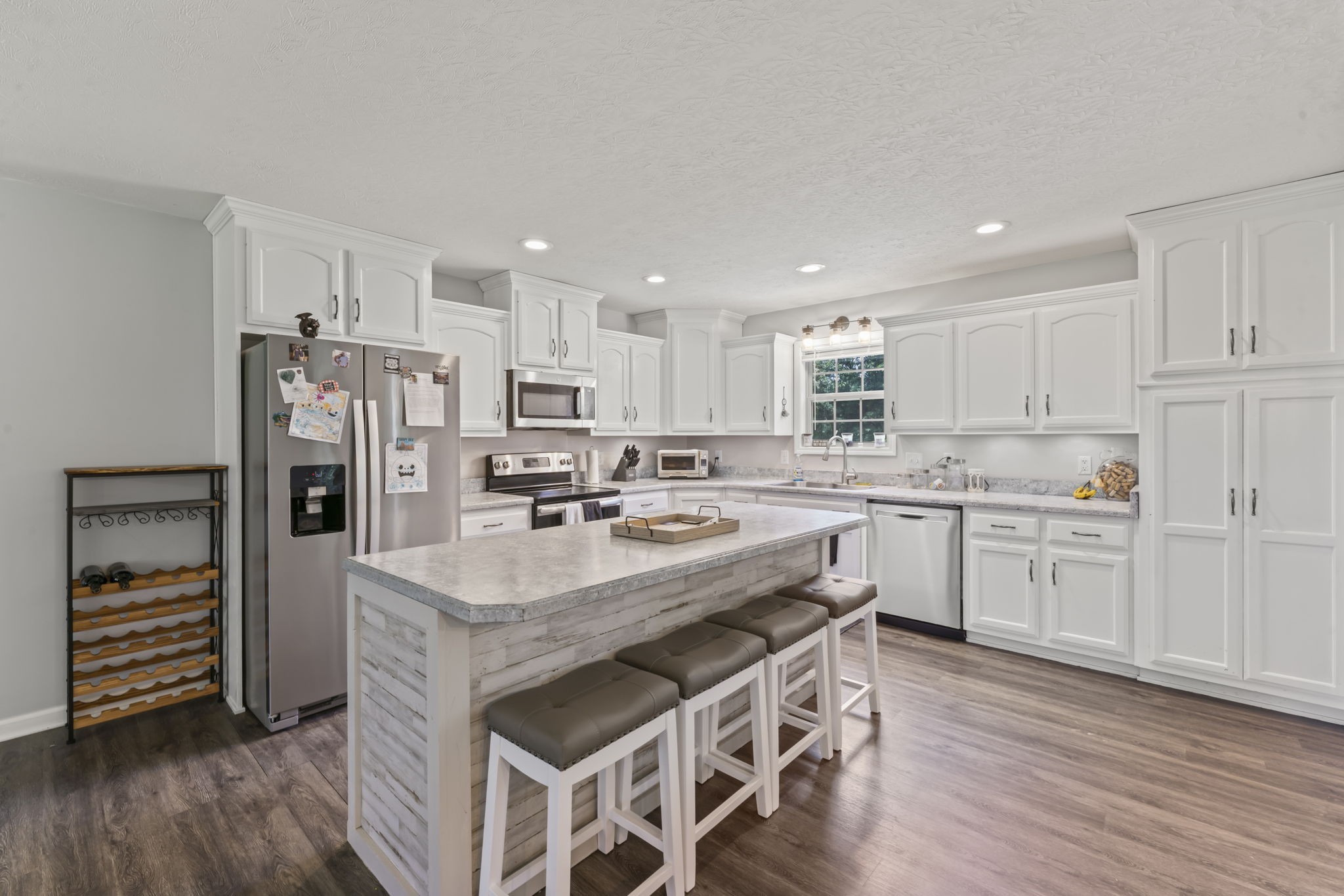 1070 Mt Vernon Road Bethpage, TN 37022 - Photo 9 of 20 a kitchen with a sink stove and refrigerator