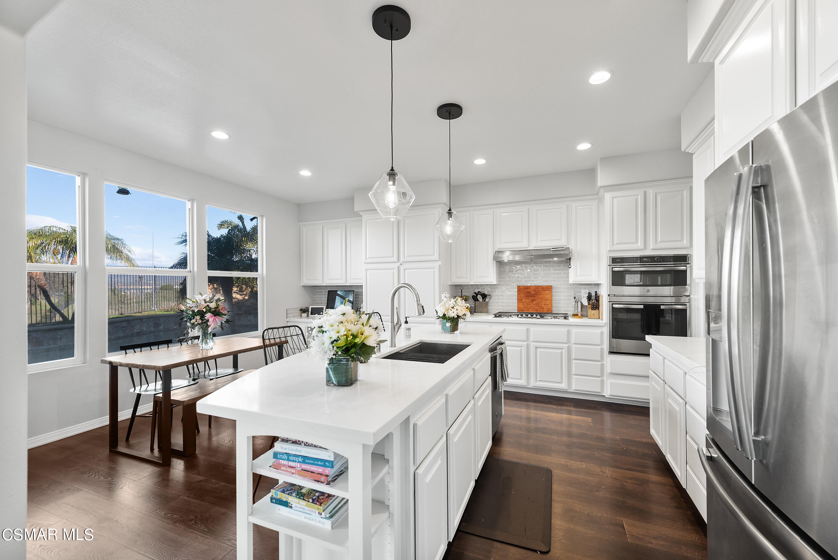 1997 Arielle Lane Simi Valley, CA 93065 - Photo 12 of 54 a kitchen with counter top space a sink appliances and cabinets