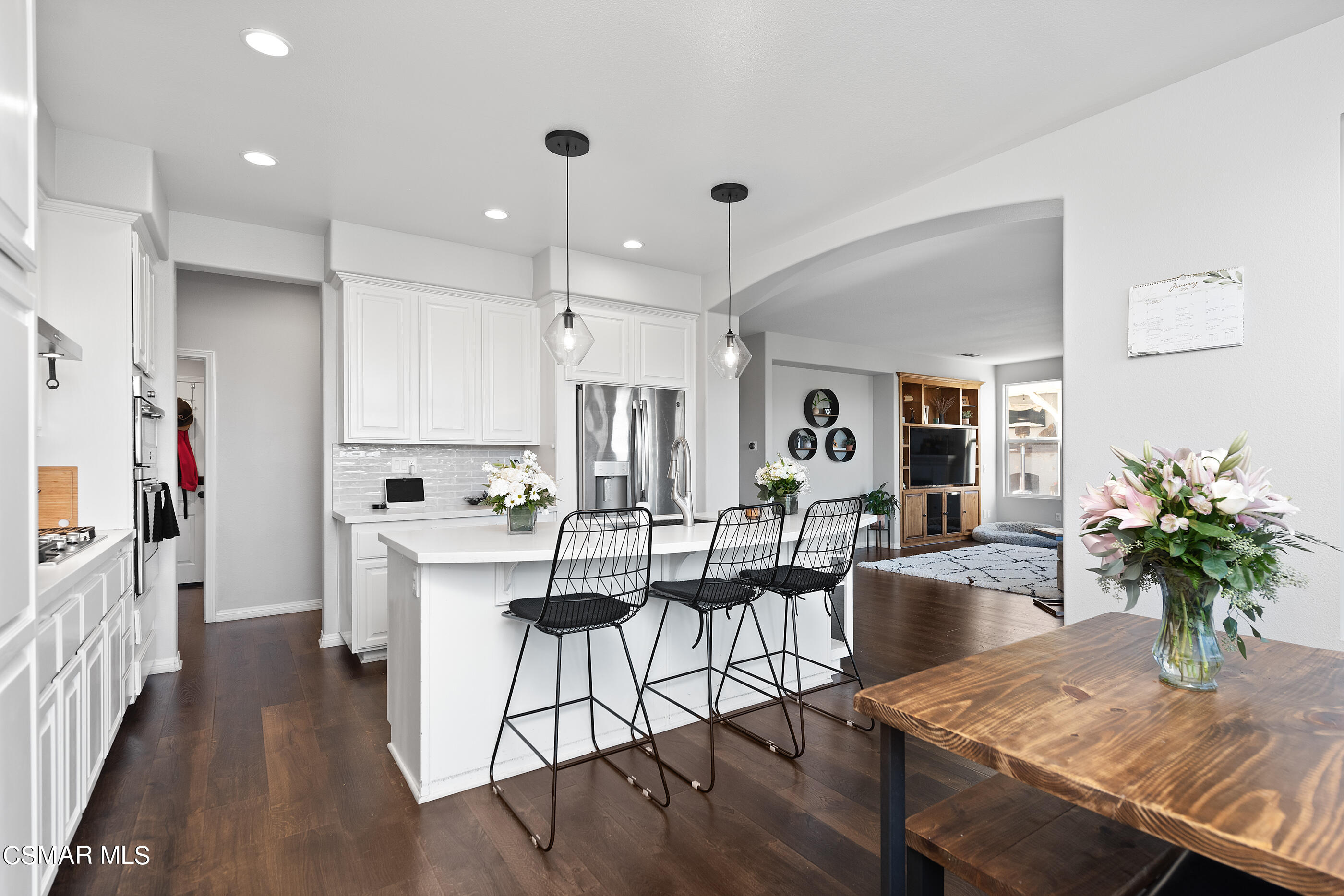 1997 Arielle Lane Simi Valley, CA 93065 - Photo 13 of 54 a view of a dining room with furniture and wooden floor