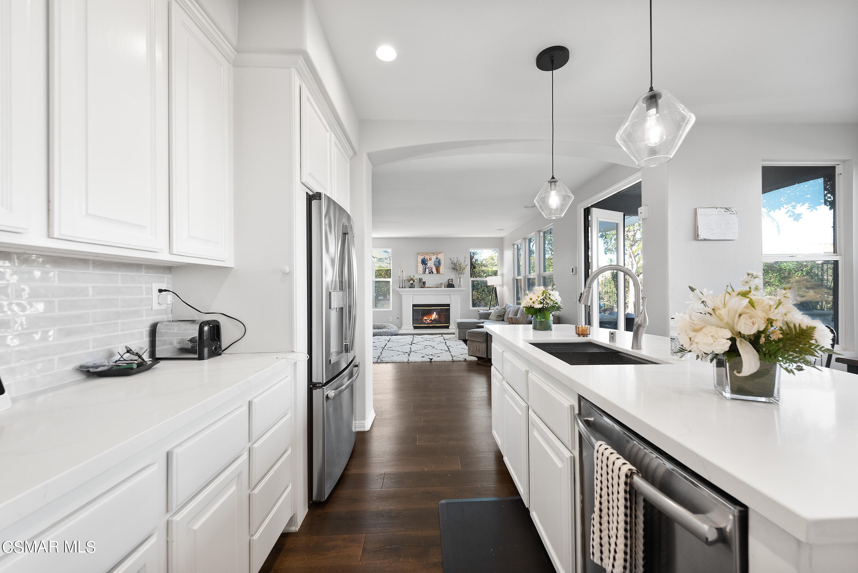 1997 Arielle Lane Simi Valley, CA 93065 - Photo 14 of 54 a kitchen with sink stove and cabinets