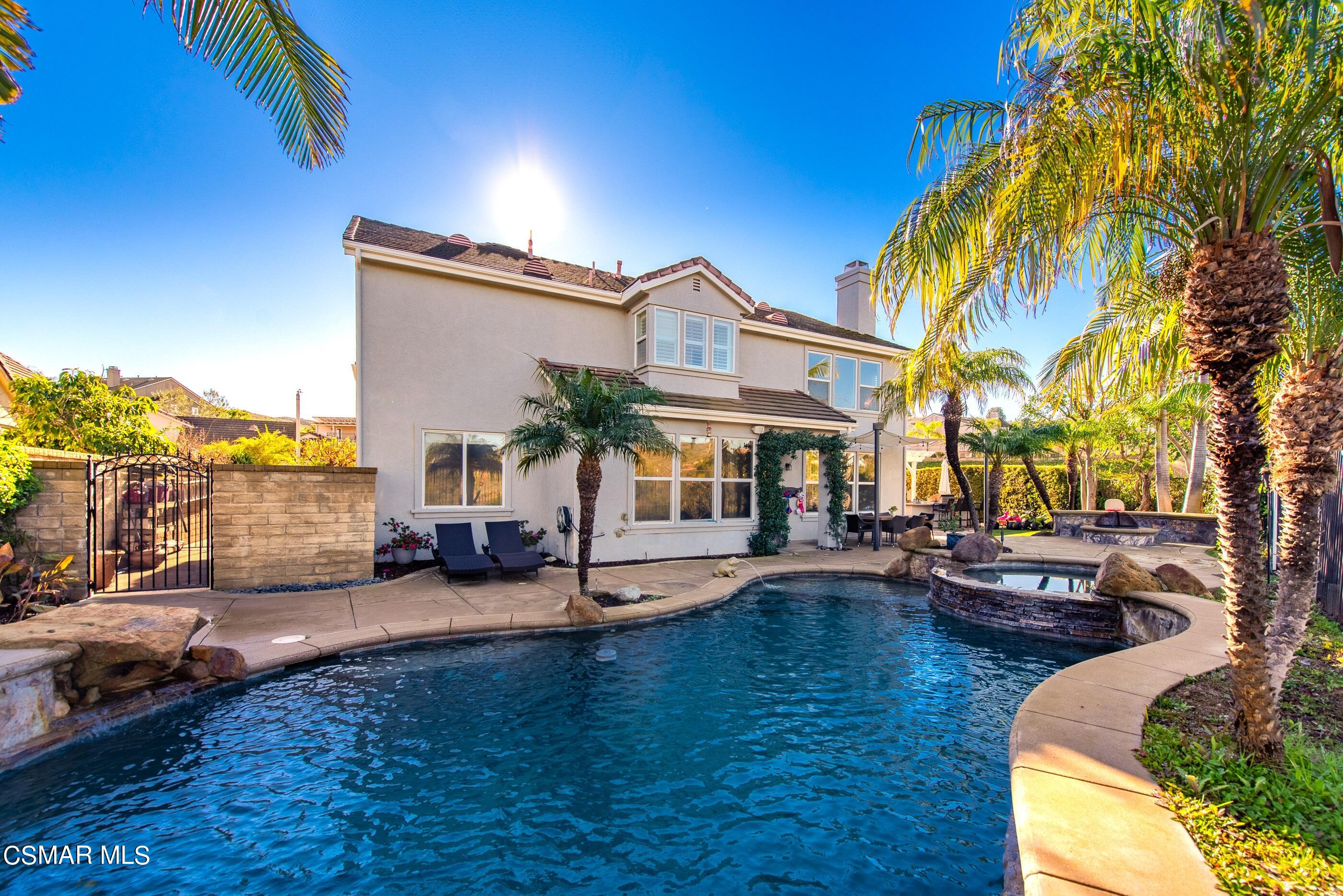 1997 Arielle Lane Simi Valley, CA 93065 - Photo 18 of 54 a view of a house with swimming pool and sitting area