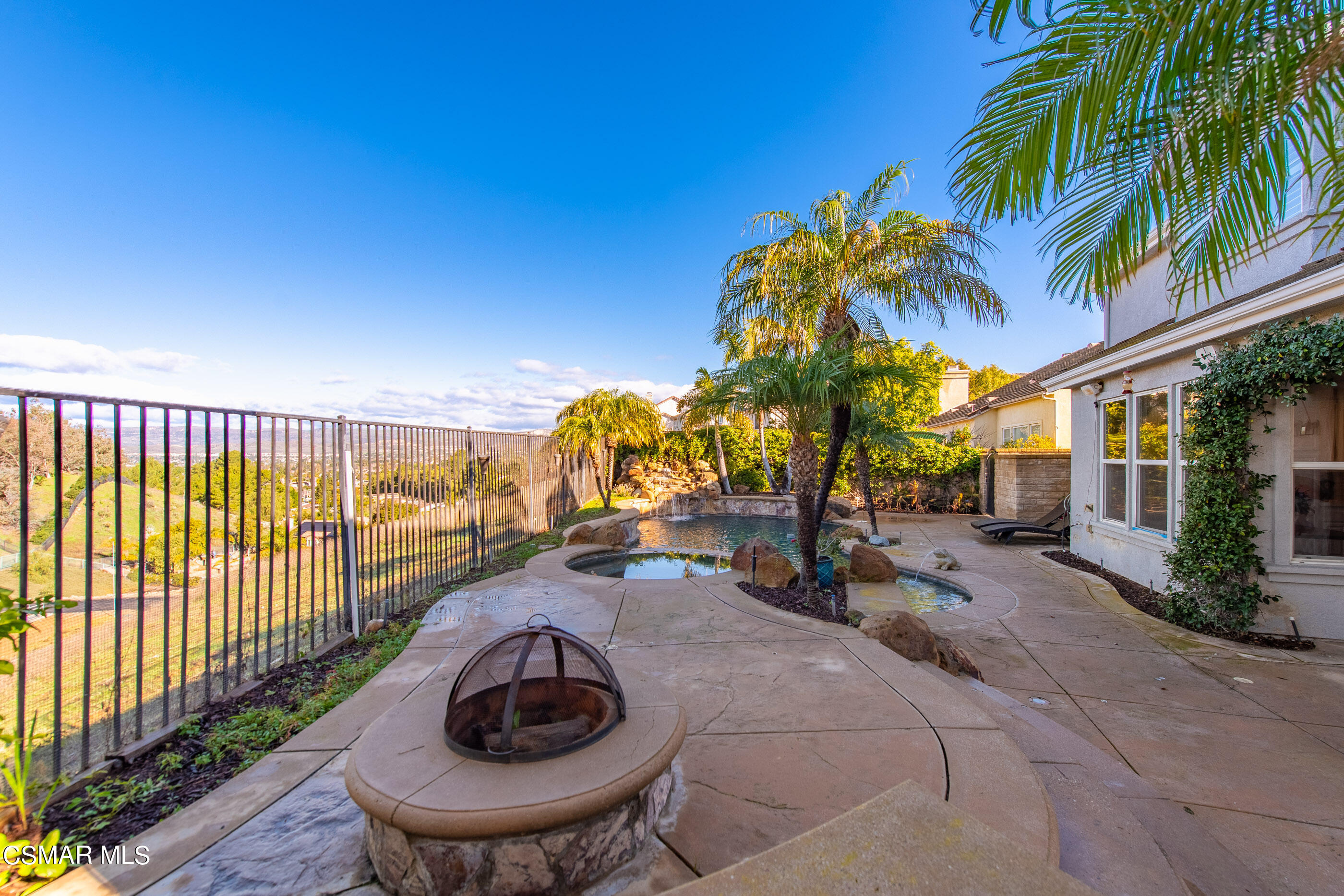1997 Arielle Lane Simi Valley, CA 93065 - Photo 19 of 54 a view of a backyard with plants and a patio