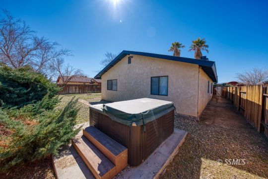 318 Reese Street Ridgecrest, CA 93555 - Photo 34 of 34 a view of a house with a yard