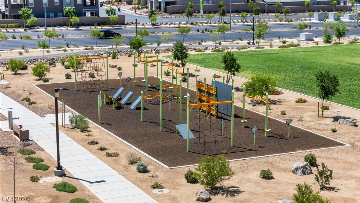 320 Isla Enclave Way Henderson, NV 89011 - Photo 43 of 49 Engaging playground with diverse equipment and ample recreational space awaits in this vibrant community.