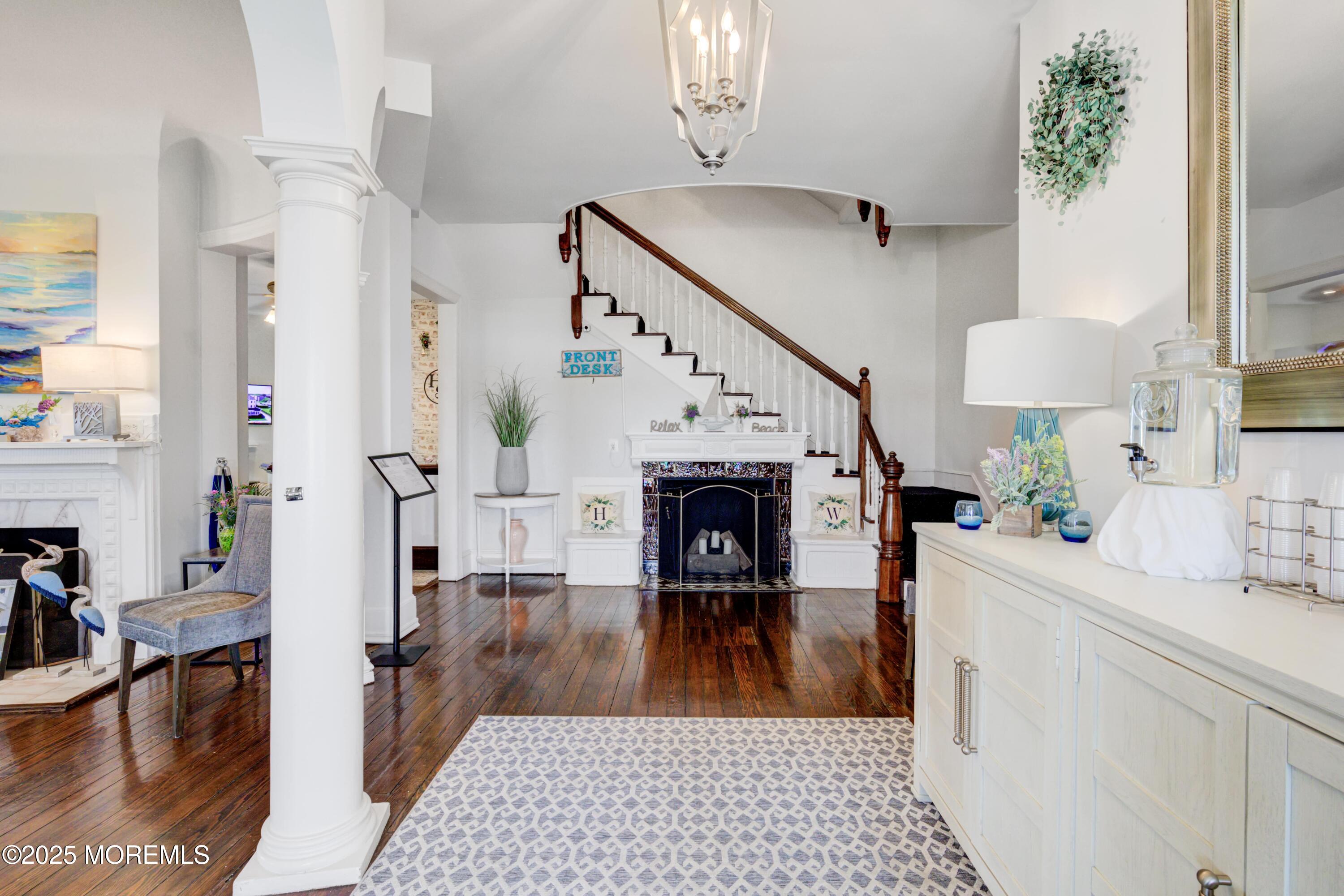 200 Monmouth Avenue, Unit 19 Spring Lake, NJ 07762 - Photo 18 of 28 a view of a hallway with dining table and chairs