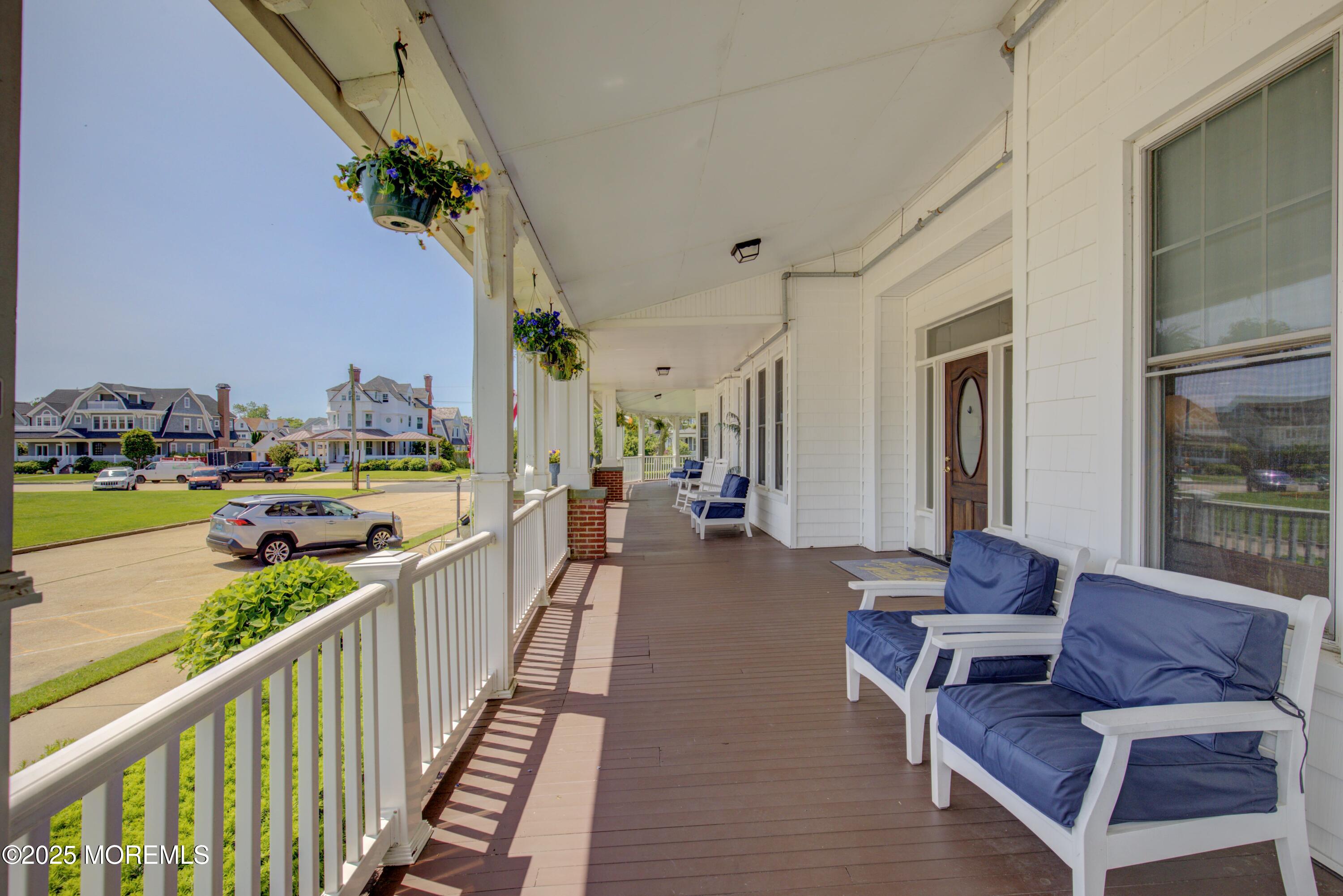 200 Monmouth Avenue, Unit 19 Spring Lake, NJ 07762 - Photo 20 of 28 a balcony with furniture and city view