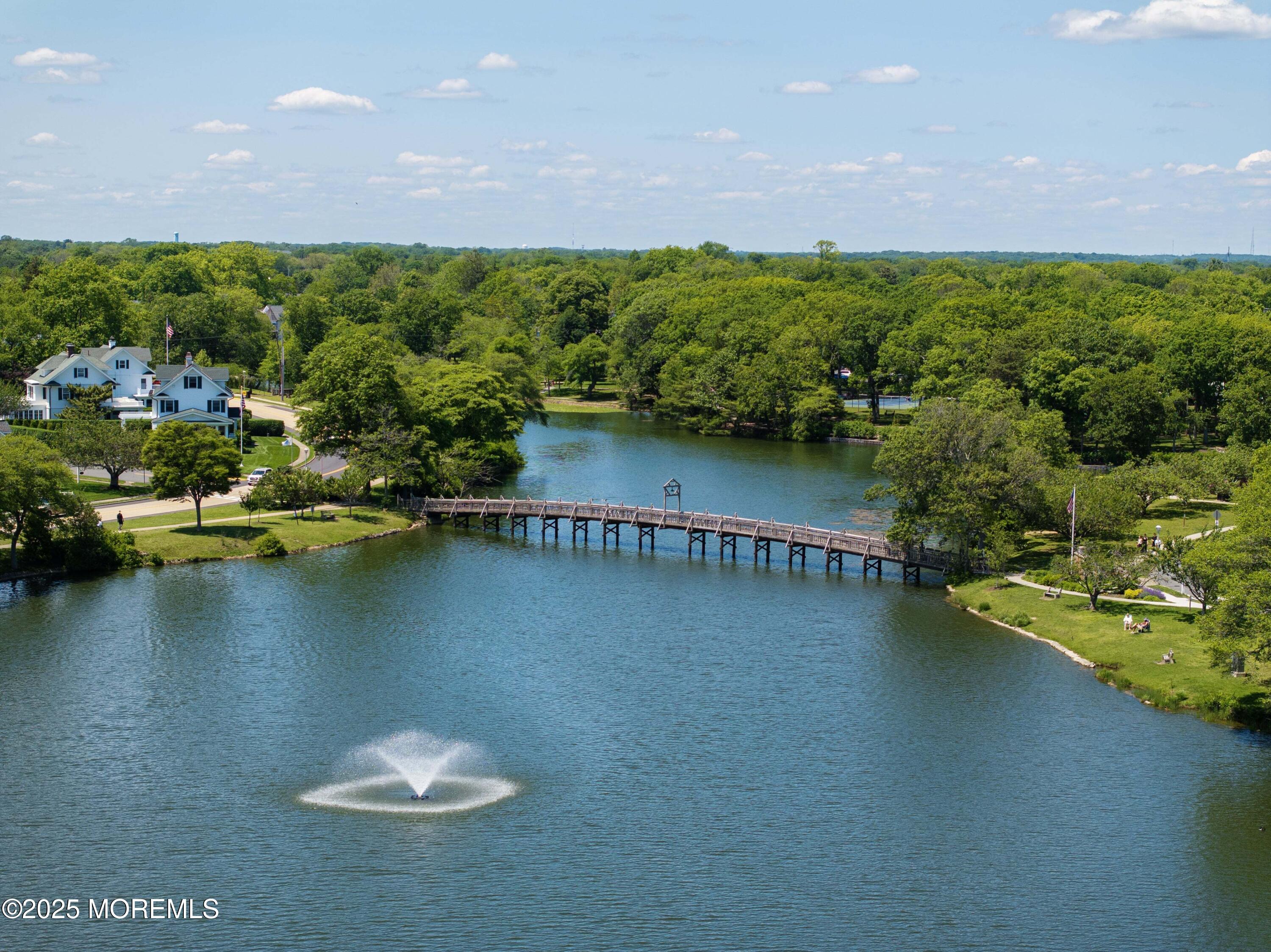 200 Monmouth Avenue, Unit 19 Spring Lake, NJ 07762 - Photo 27 of 28 a view of a city next to a lake