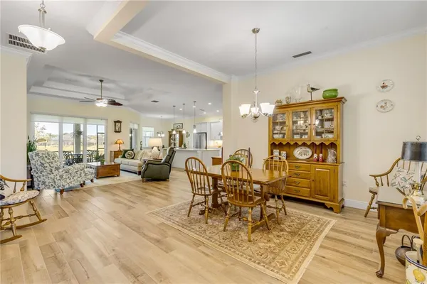 a living room with lots of furniture and gym equipment