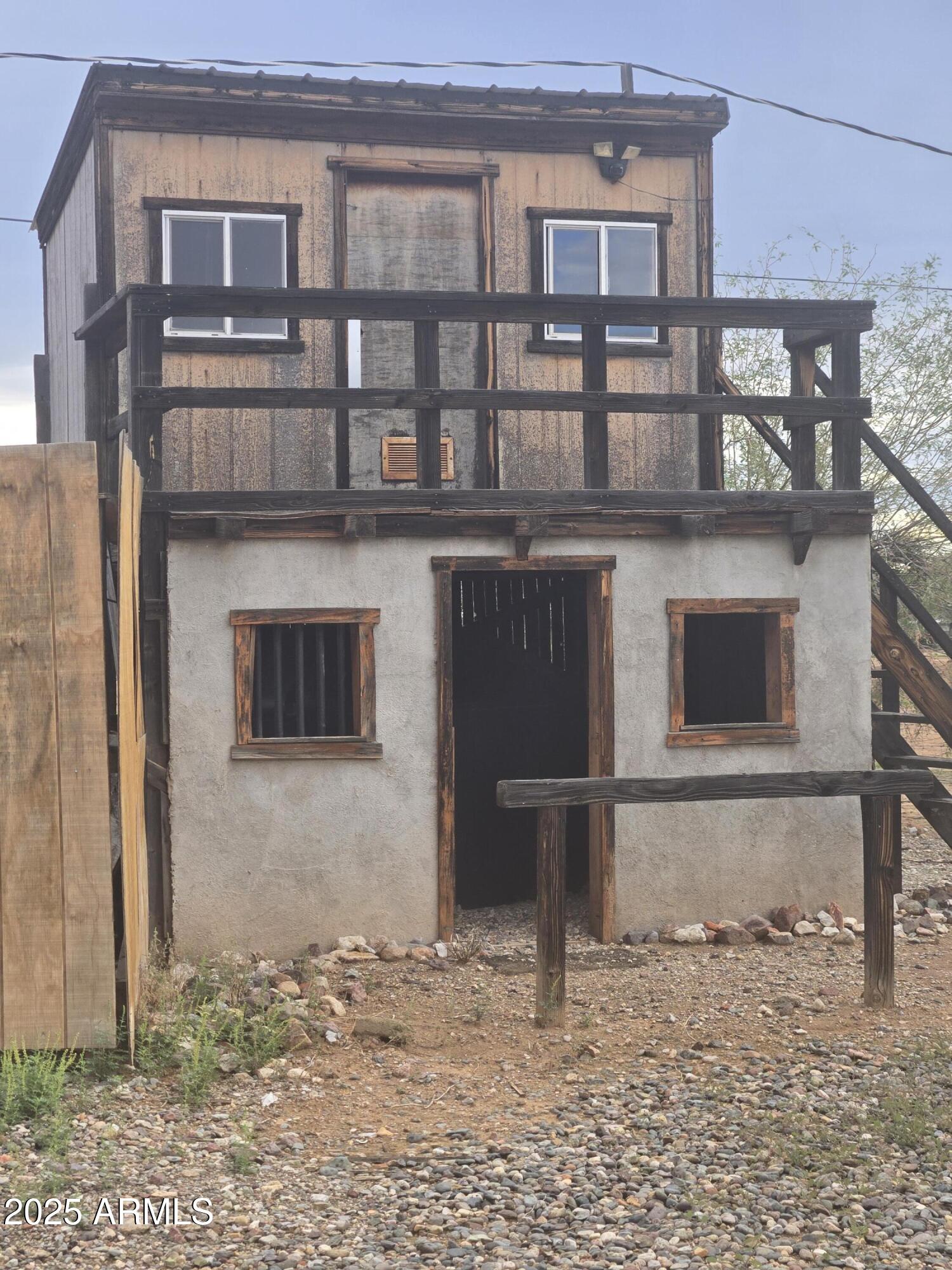 17963 West Patrick Lane, Unit 5 Surprise, AZ 85387 - Photo 11 of 15 a front view of a house with a yard