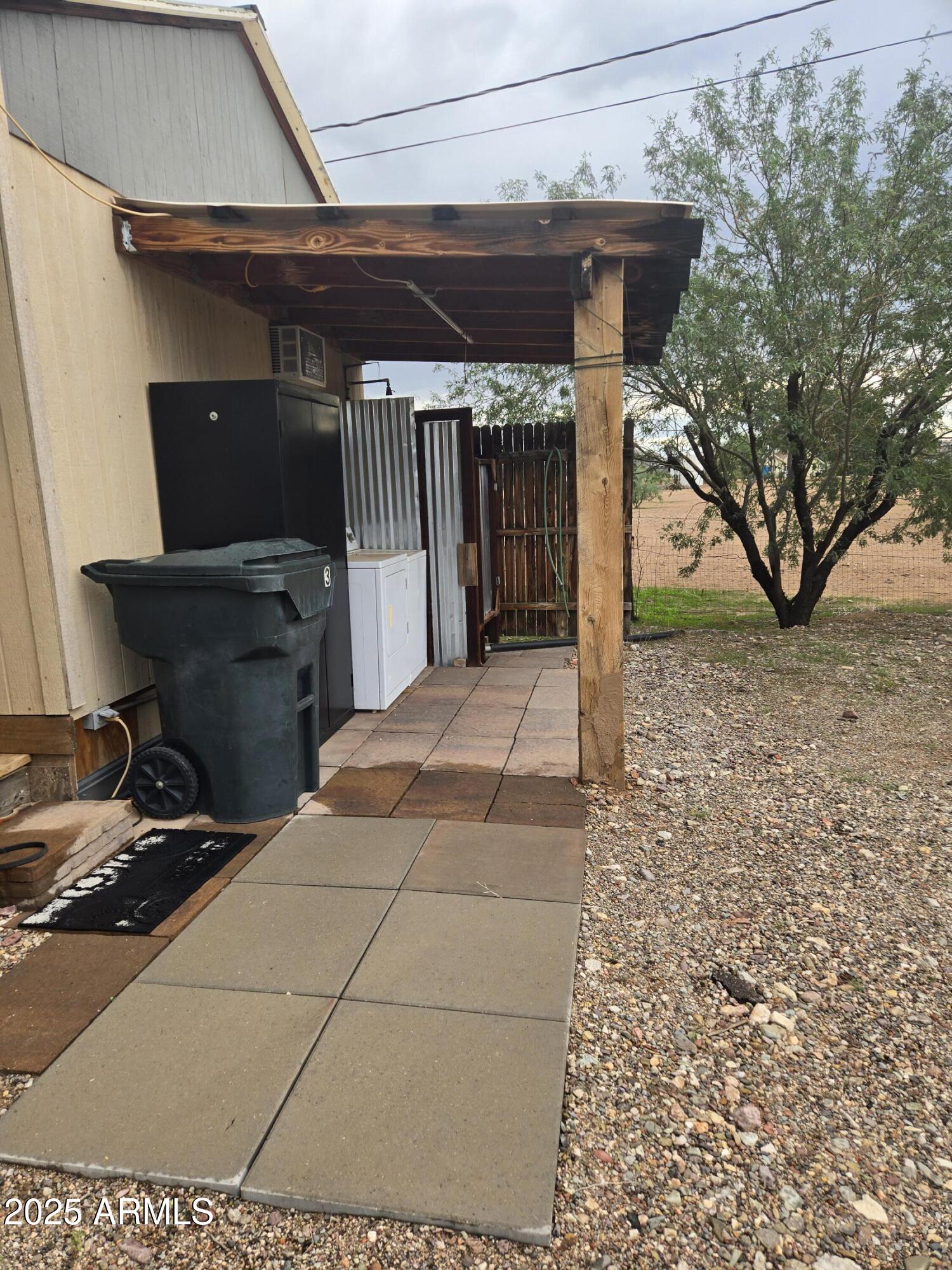 17963 West Patrick Lane, Unit 5 Surprise, AZ 85387 - Photo 3 of 15 a view of backyard with cabin
