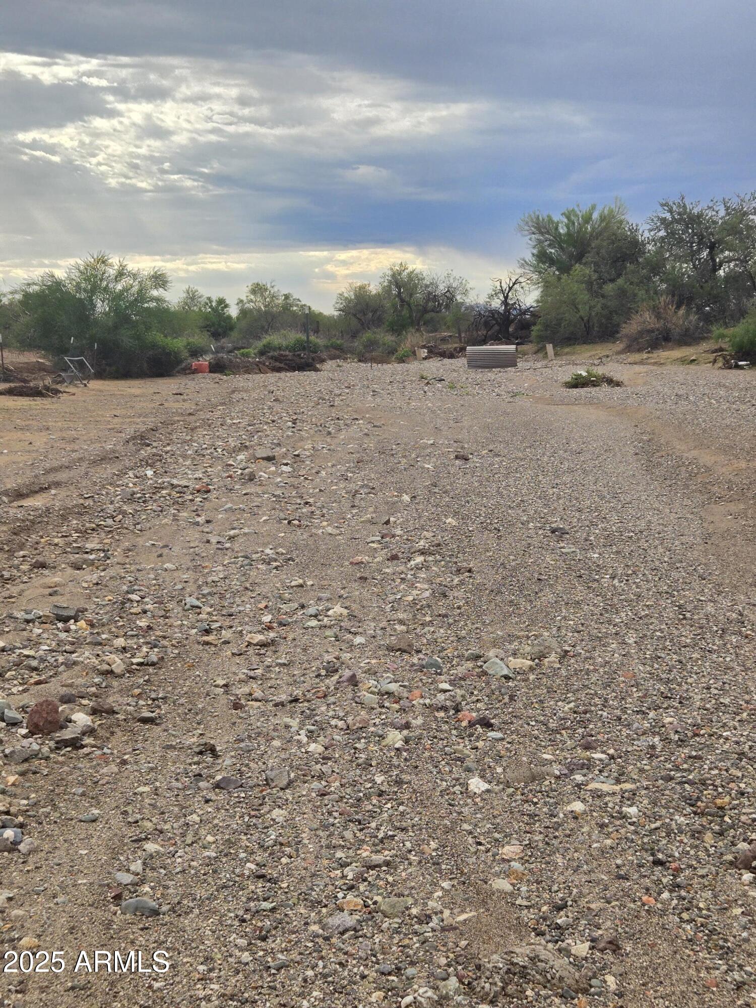 17963 West Patrick Lane, Unit 5 Surprise, AZ 85387 - Photo 7 of 15 a view of a field with an ocean in background