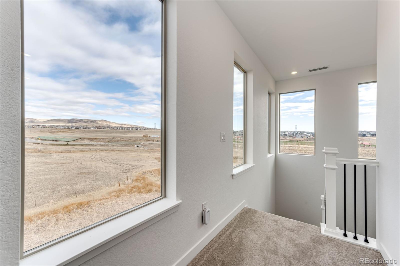 3100 South Russell Street Morrison, CO 80465 - Photo 17 of 29 a view of hallway with livingroom