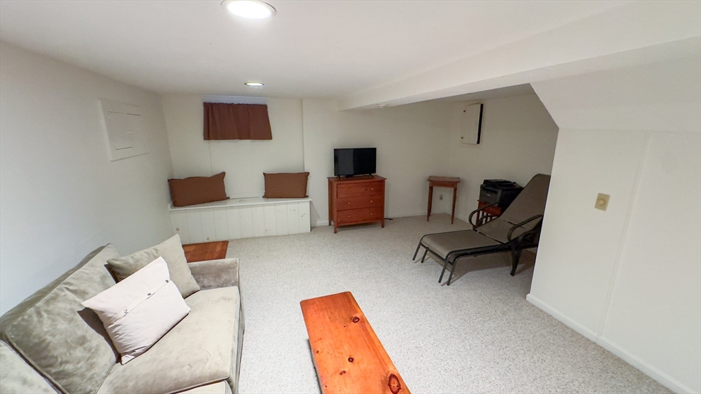 300 Buck Island Road, Unit 14F Yarmouth, MA 02673 - Photo 19 of 29 a living room with furniture and a couch