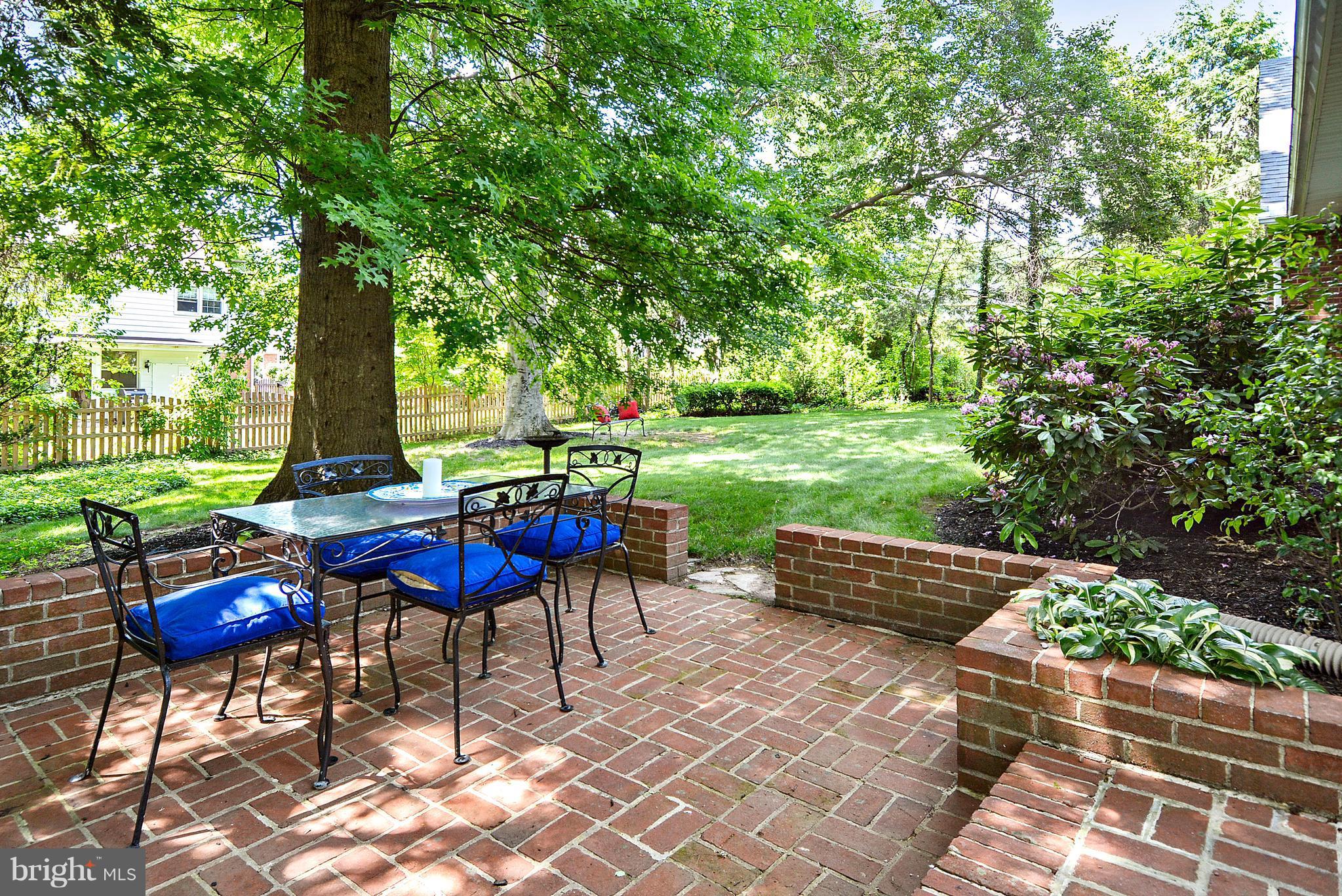 7006 Copeleigh Road Baltimore, MD 21212 - Photo 25 of 26 Handsome, brick-walled patio in shaded back yard.