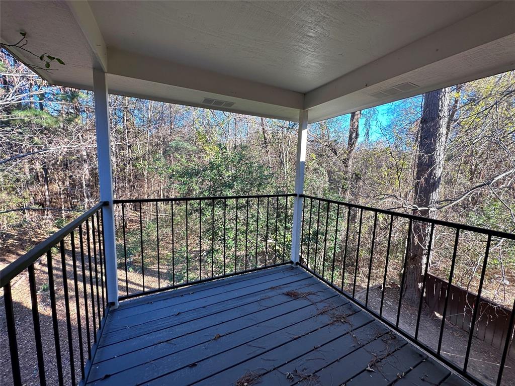 2006 Jane Street, Unit H Longview, TX 75601 - Photo 9 of 12 a view of balcony with wooden floor