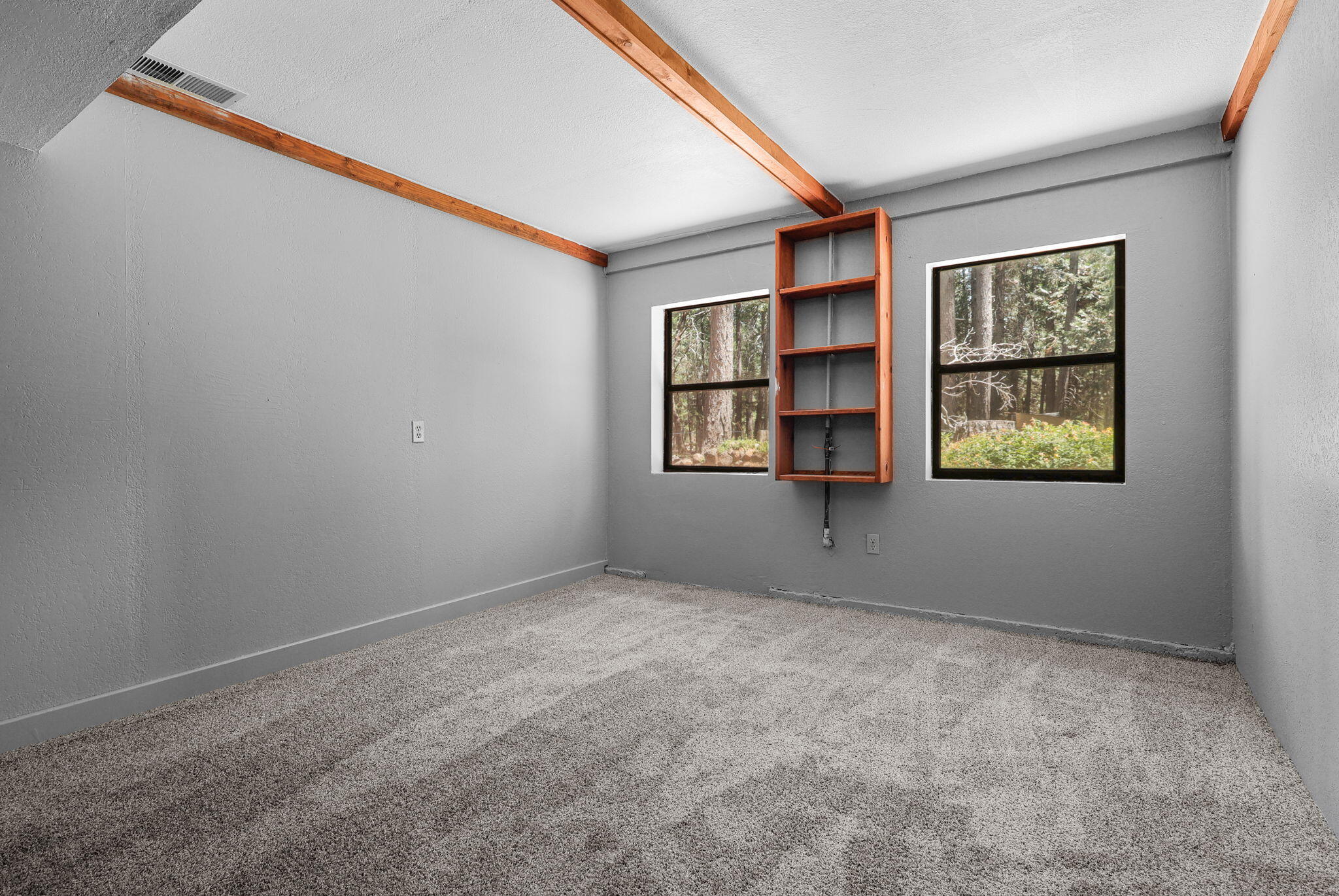 8238 Starlite Pines Road Shingletown, CA 96088 - Photo 11 of 25 a view of an empty room with a window