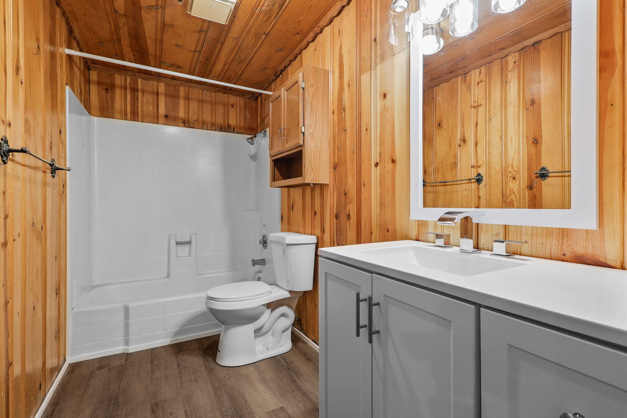 8238 Starlite Pines Road Shingletown, CA 96088 - Photo 12 of 25 a bathroom with a sink and a toilet
