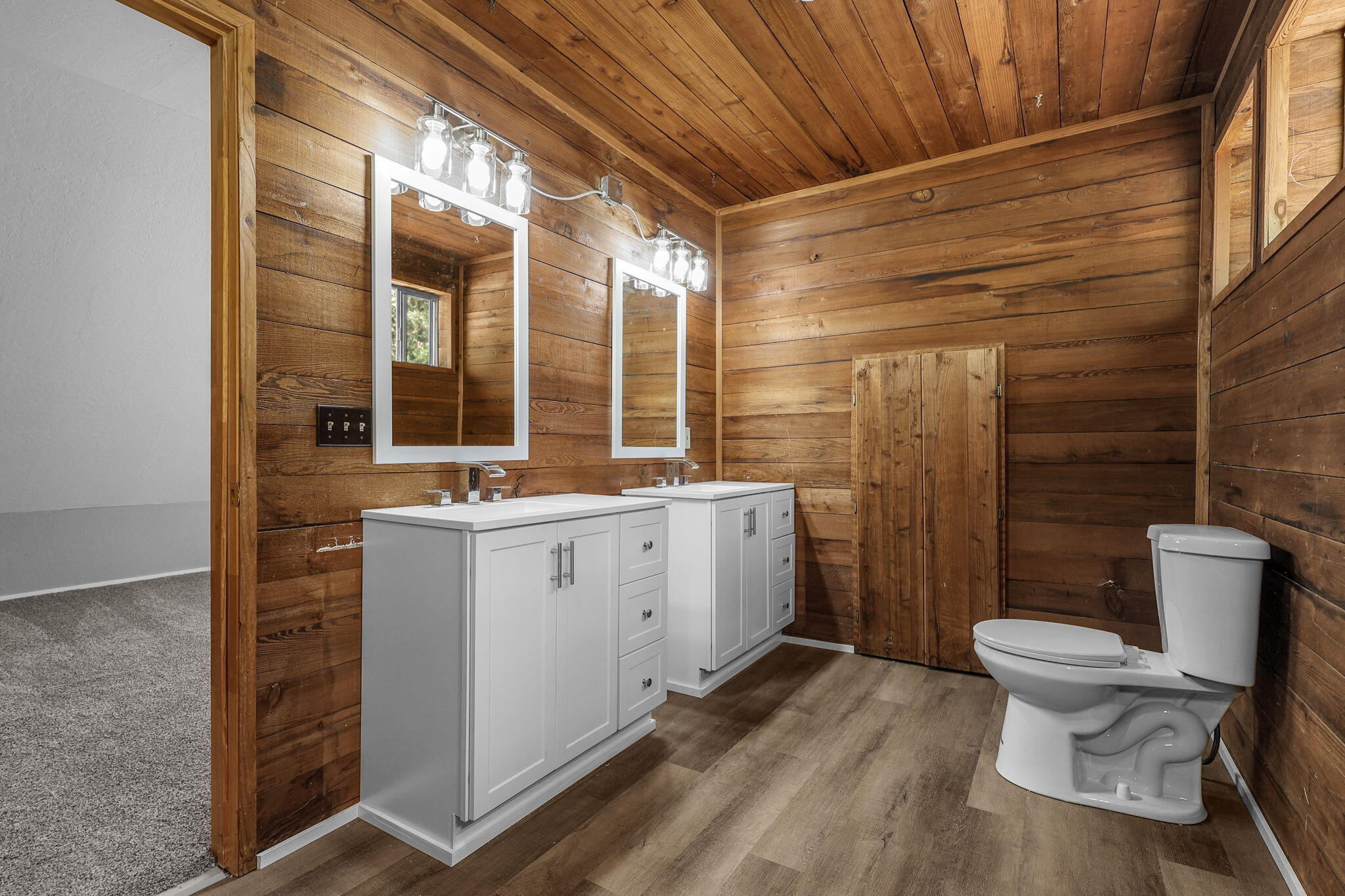 8238 Starlite Pines Road Shingletown, CA 96088 - Photo 17 of 25 a bathroom with a granite countertop sink toilet and shower