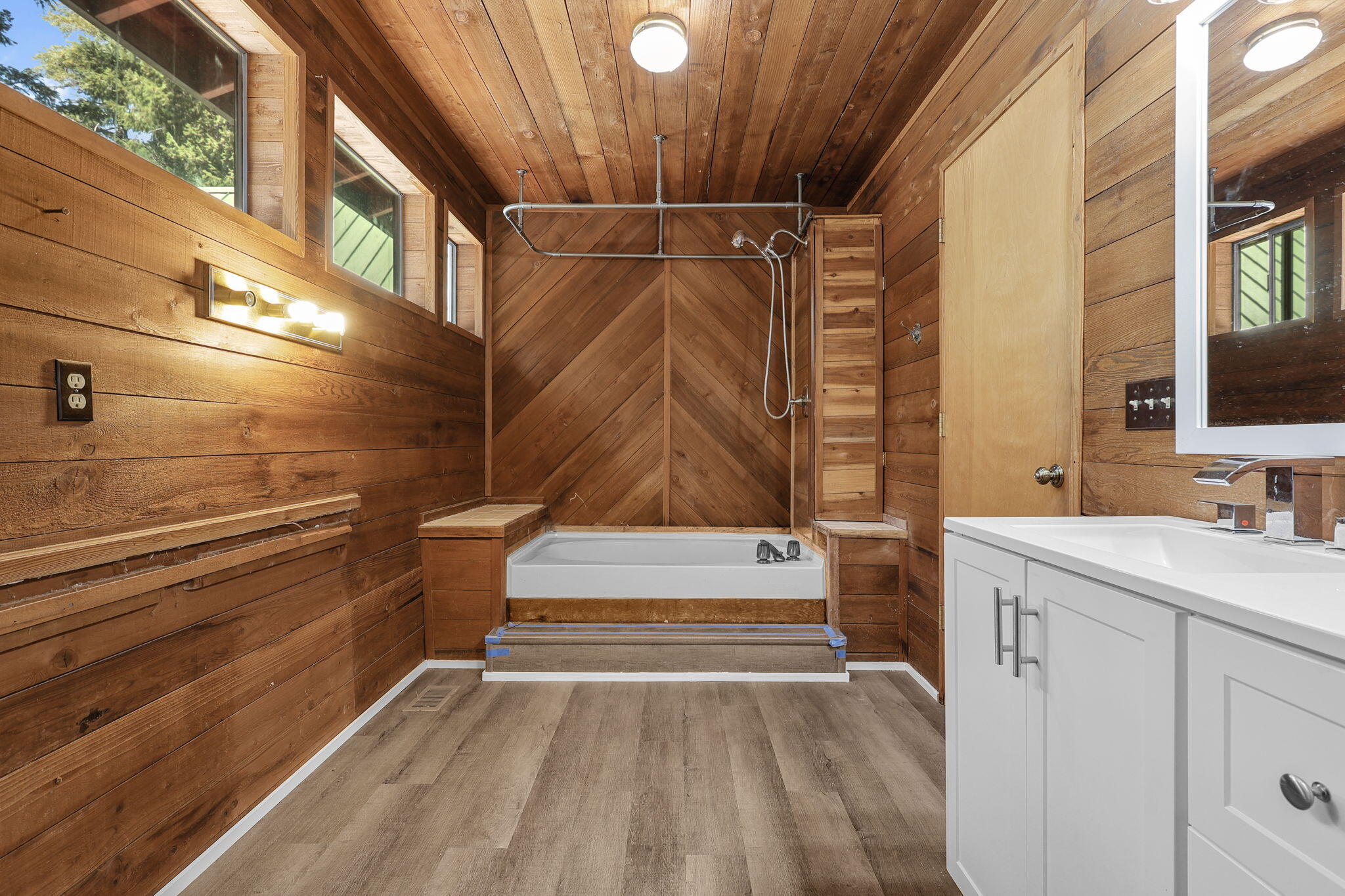 8238 Starlite Pines Road Shingletown, CA 96088 - Photo 18 of 25 a bathroom with a sink and a mirror