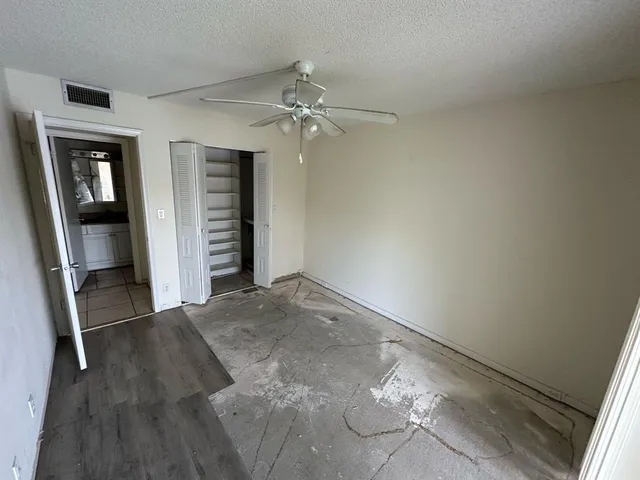 wooden floor in a hall with an entryway