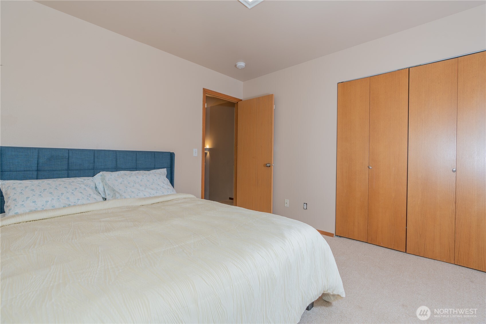 27309 111th Place Southeast Kent, WA 98030 - Photo 12 of 20 a bedroom with a bed and a window