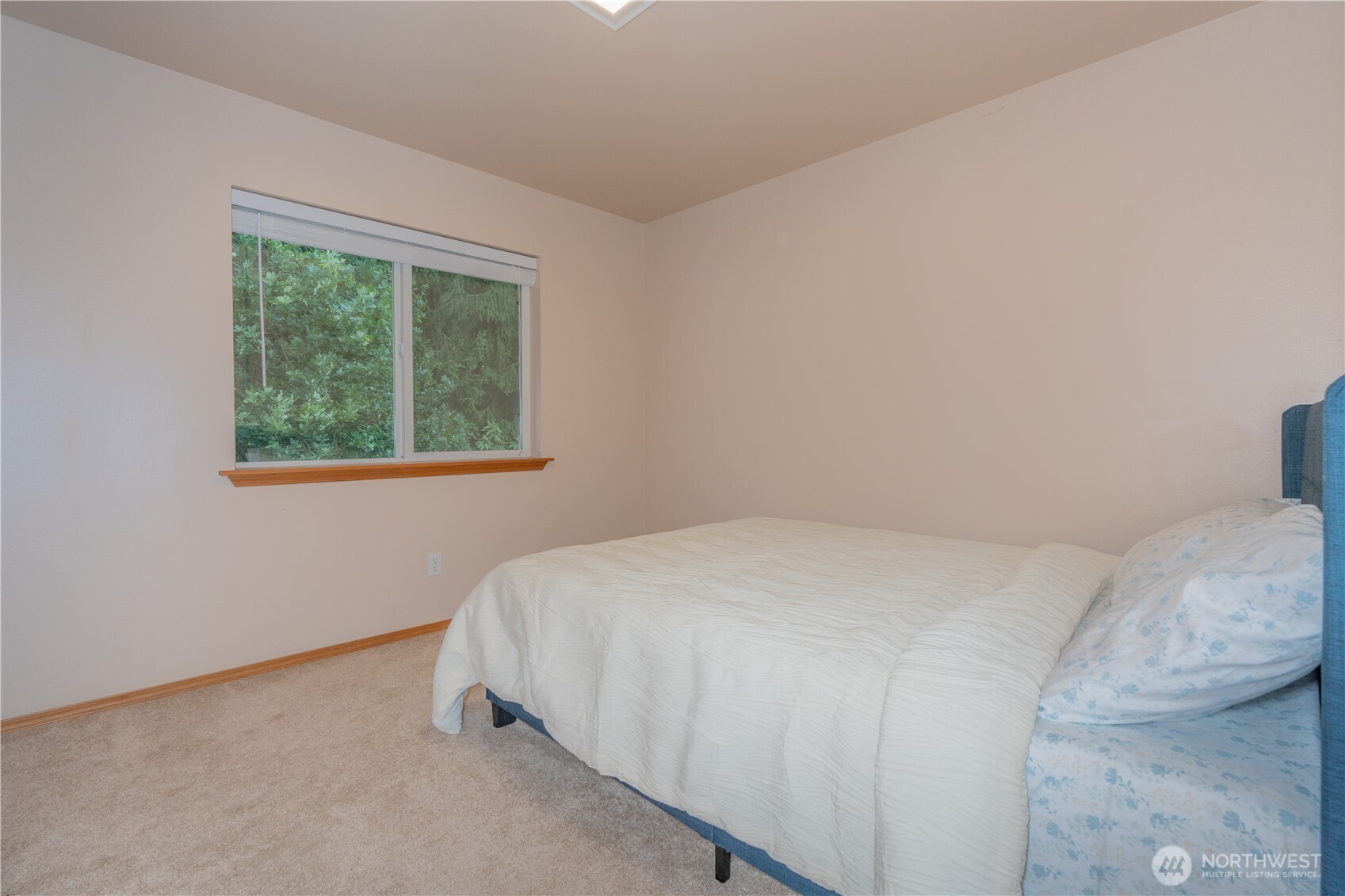 27309 111th Place Southeast Kent, WA 98030 - Photo 13 of 20 a bedroom with a bed and a window