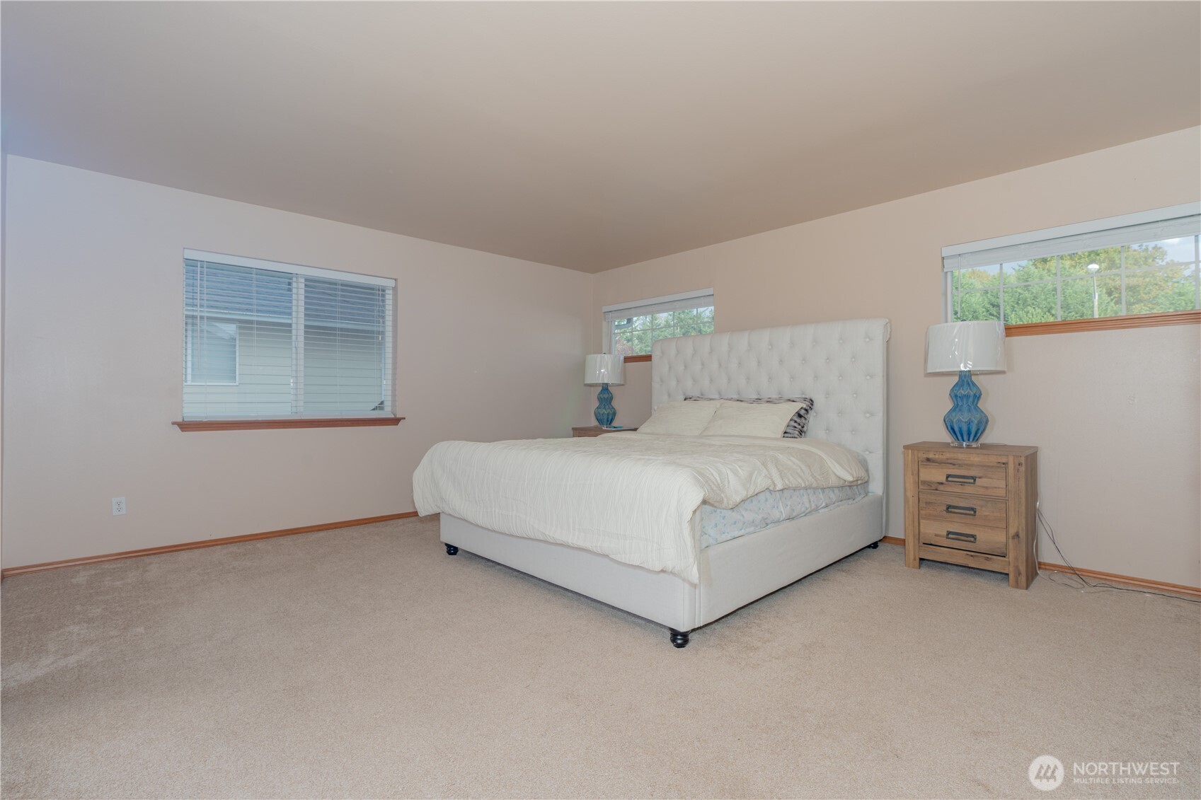 27309 111th Place Southeast Kent, WA 98030 - Photo 17 of 20 a bedroom with a bed and a window