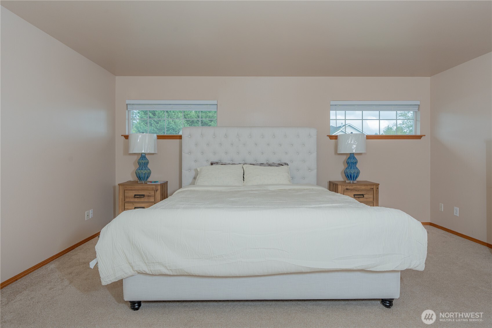 27309 111th Place Southeast Kent, WA 98030 - Photo 18 of 20 a bedroom with a bed and window