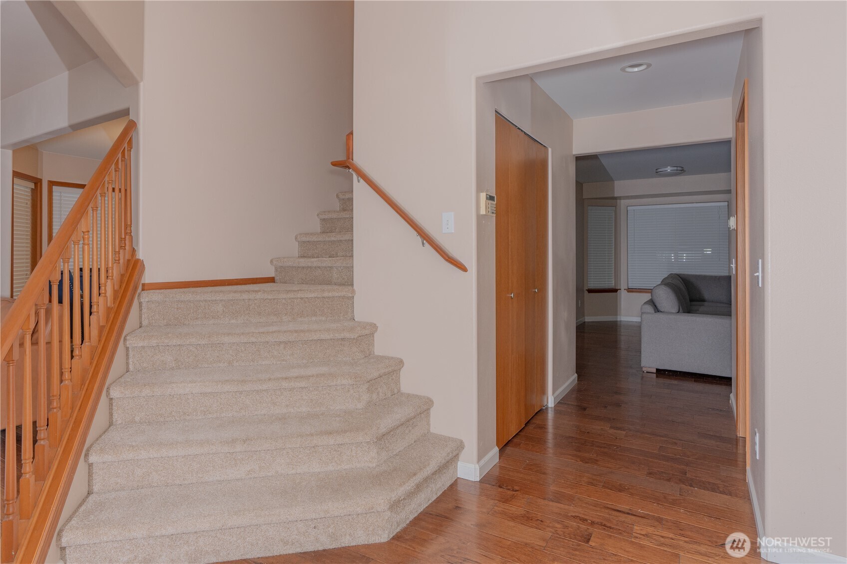 27309 111th Place Southeast Kent, WA 98030 - Photo 10 of 20 a view of entryway and bedroom with wooden floor