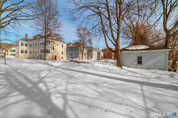 a view of snow on the side of road