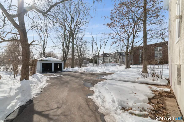 a view of a yard with a swimming pool