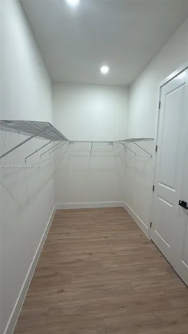 a bathroom with a shower toilet and sink