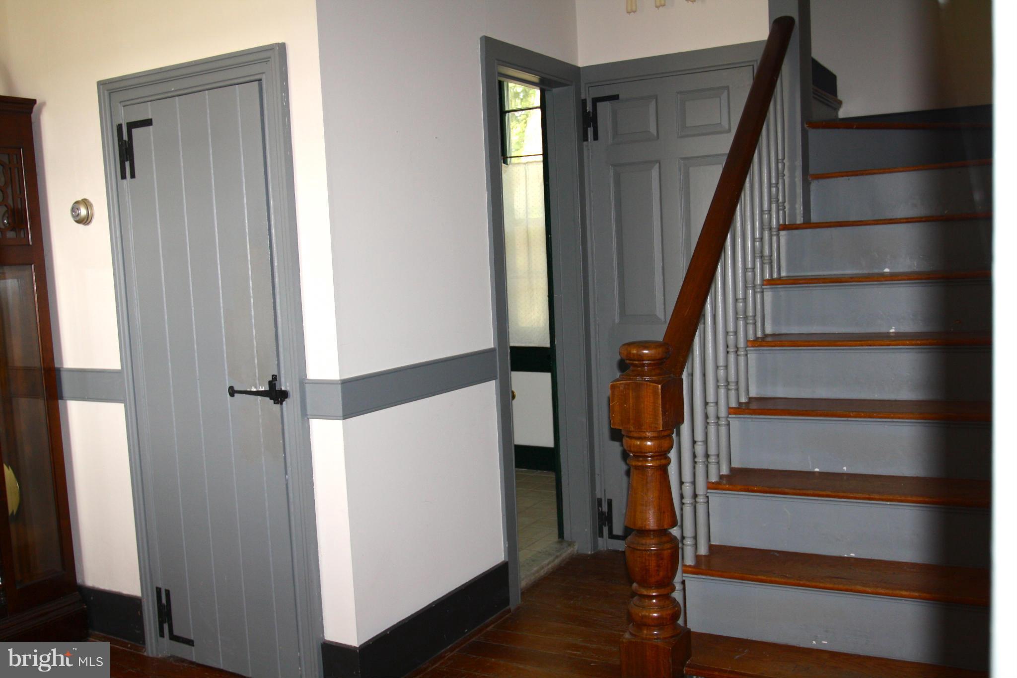4000 Chaneyville Road Owings, MD 20736 - Photo 8 of 30 a view of entryway with wooden floor and stairs