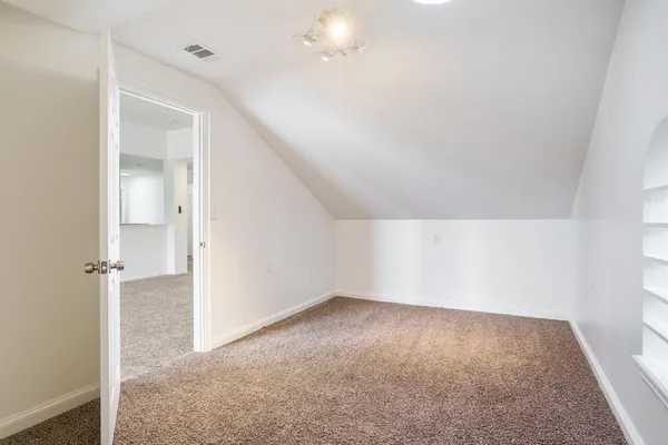 an empty room with a natural light