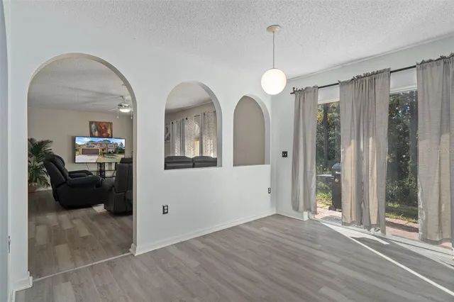 a kitchen with a sink stove and refrigerator