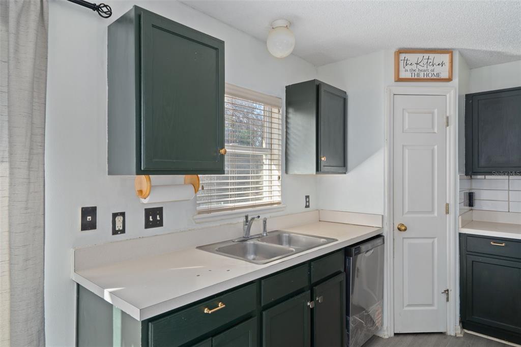 2359 Gimlet Avenue Spring Hill, FL 34608 - Photo 23 of 52 a bathroom with a sink and a mirror