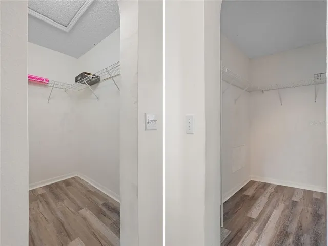 a bathroom with a sink a mirror and a shower