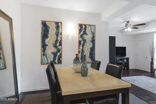 a view of a dining room with furniture