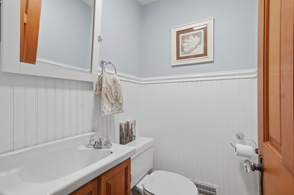 16 Cheswick Road Arlington, MA 02474 - Photo 19 of 35 a bathroom with a sink mirror and toilet