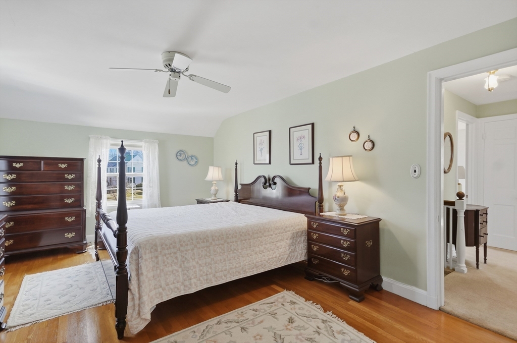 16 Cheswick Road Arlington, MA 02474 - Photo 20 of 35 a bedroom with a bed and wooden floor