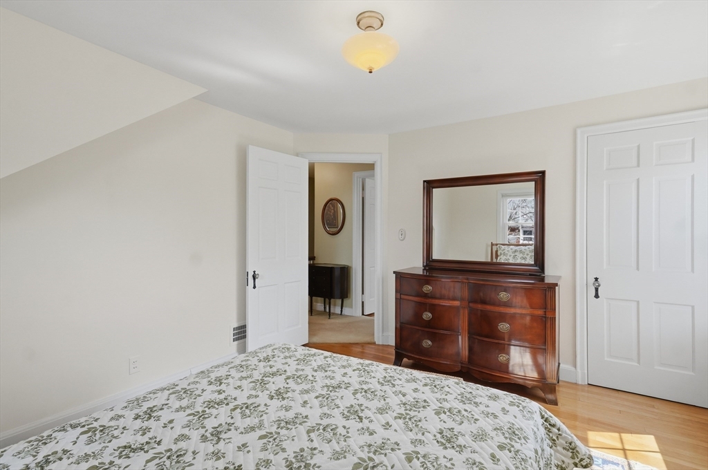 16 Cheswick Road Arlington, MA 02474 - Photo 25 of 35 a room with a dresser and a mirror