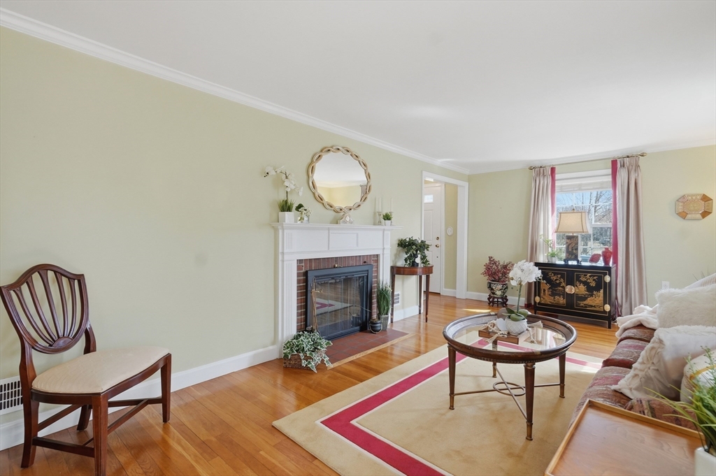 16 Cheswick Road Arlington, MA 02474 - Photo 5 of 35 a living room with furniture and a fireplace