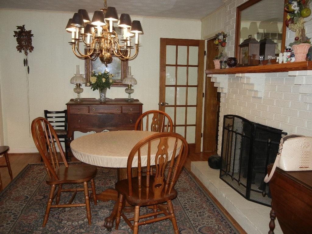 6469 Patmore Road Memphis, TN 38134 - Photo 11 of 27 With a fireplace and Chandelier