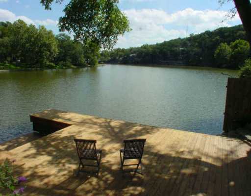a view of a lake from a balcony