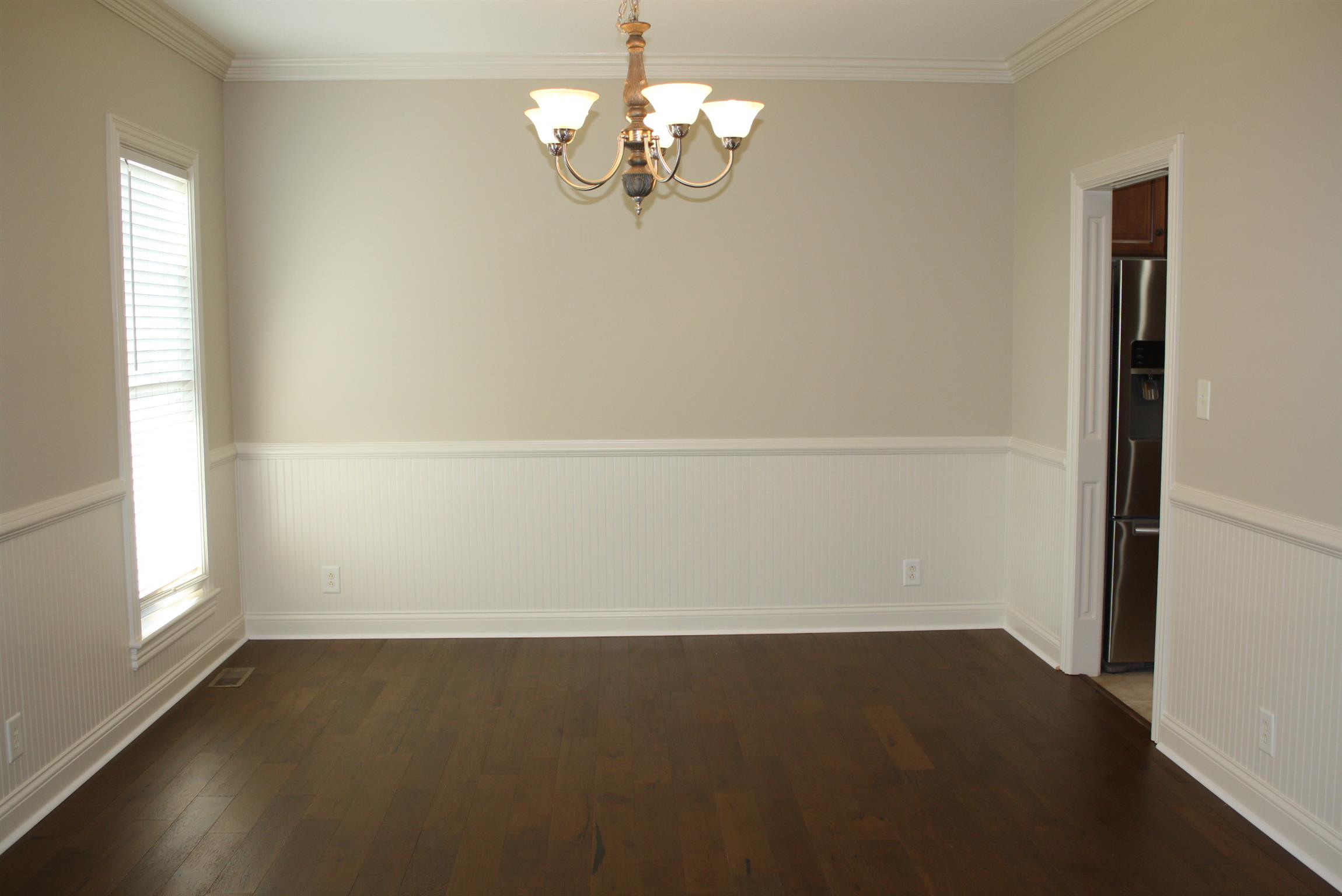 3620 Guthrie Road Clarksville, TN 37043 - Photo 10 of 30 wooden floor in an empty room with a window