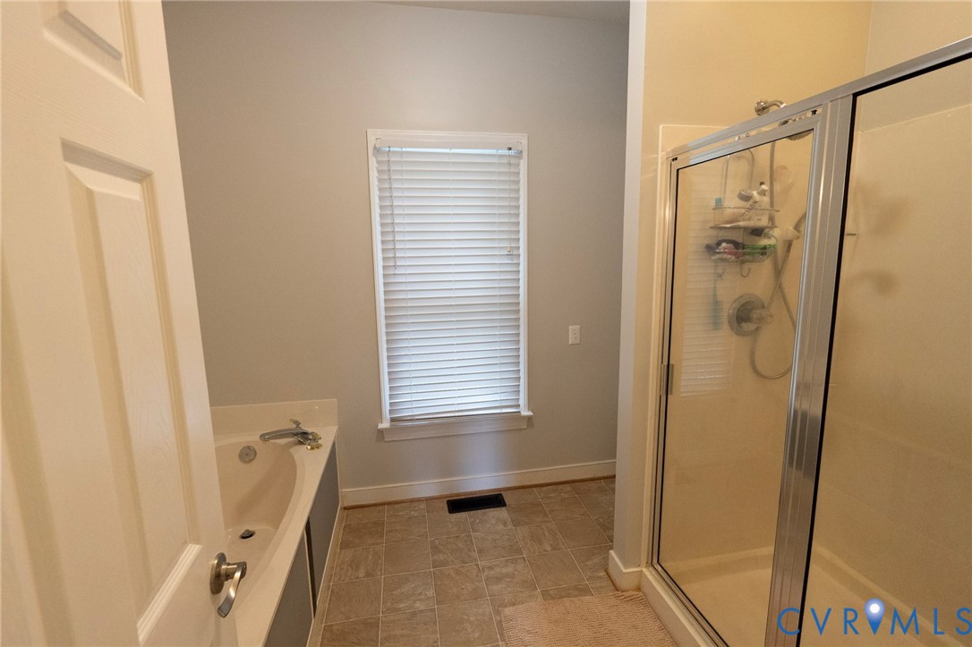 1670 Mill Quarter Road Powhatan, VA 23139 - Photo 12 of 24 First floor primary bath shower, soaking tub